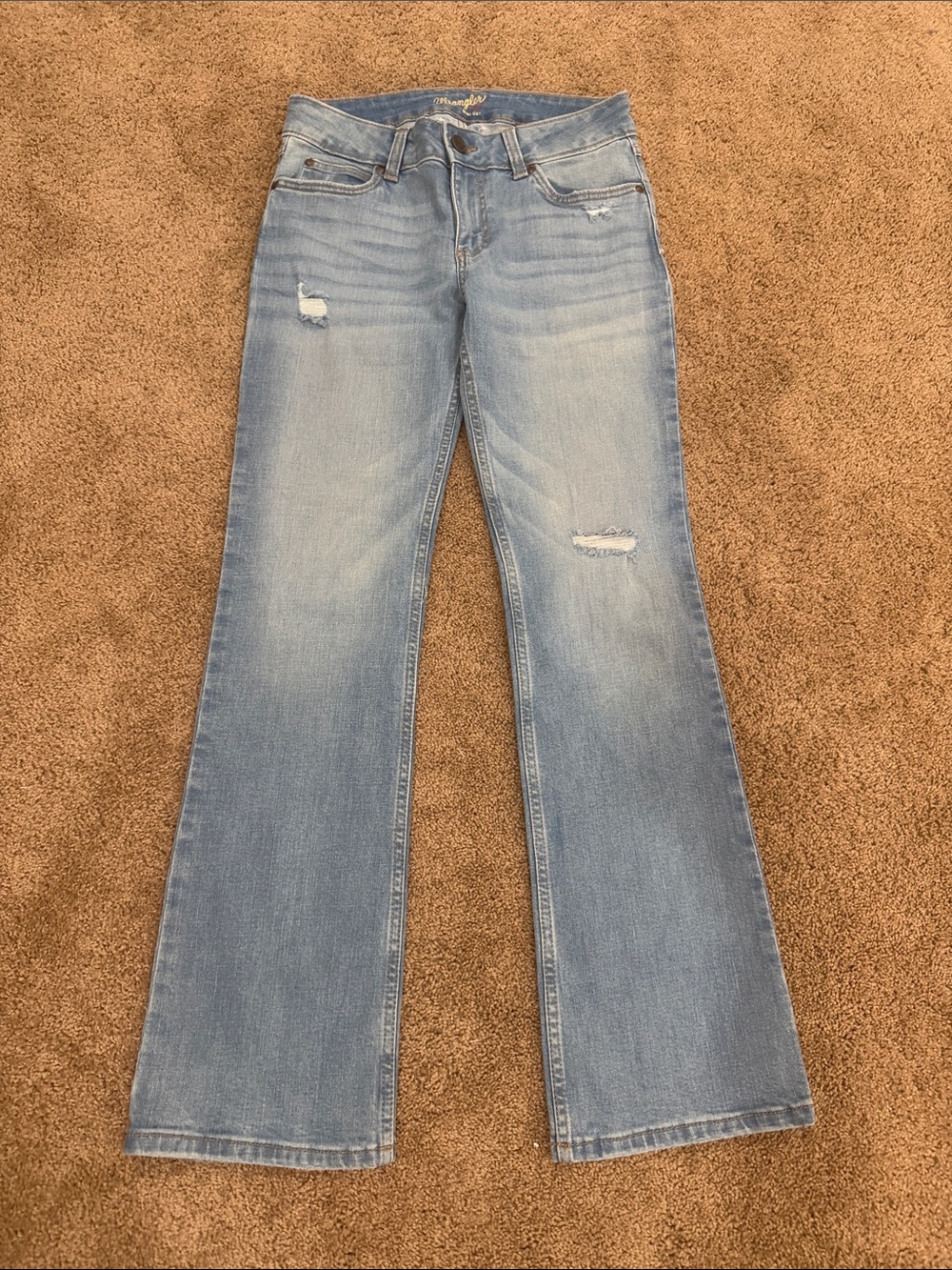 Wrangler Light Blue Flare Jeans with Subtle Distressing